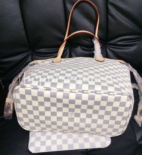 louis vuitton neverfull how to spot a fake|knockoff Louis Vuitton handbags china.